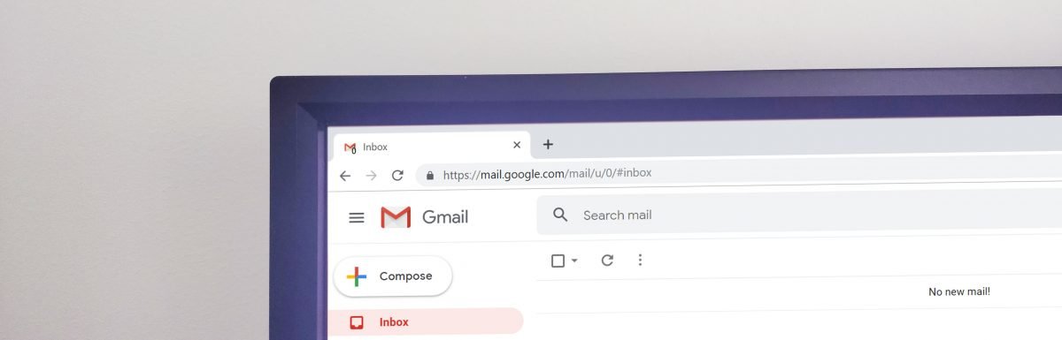 desktop computer with gmail open